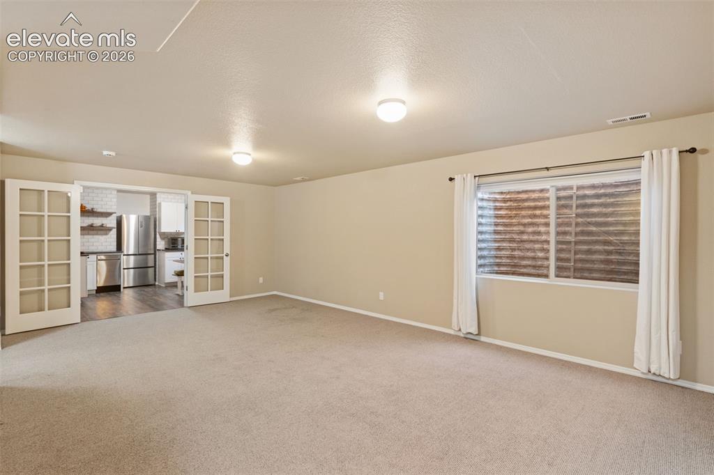 Image 19 of 39: Basement rec area