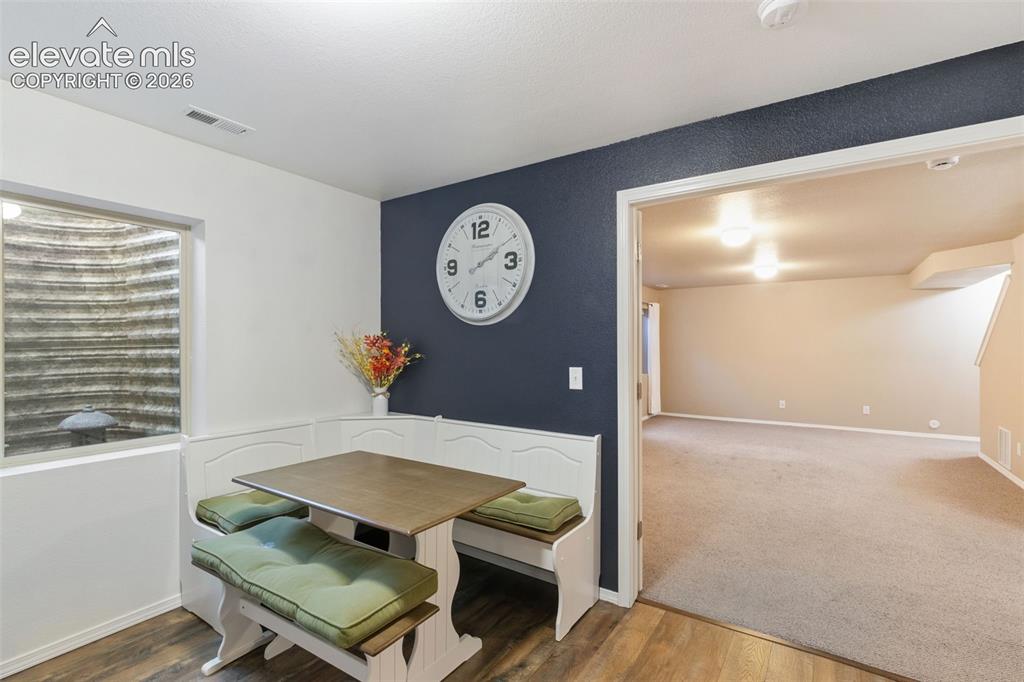 Image 26 of 39: Additonal kitchen and dining area in basement