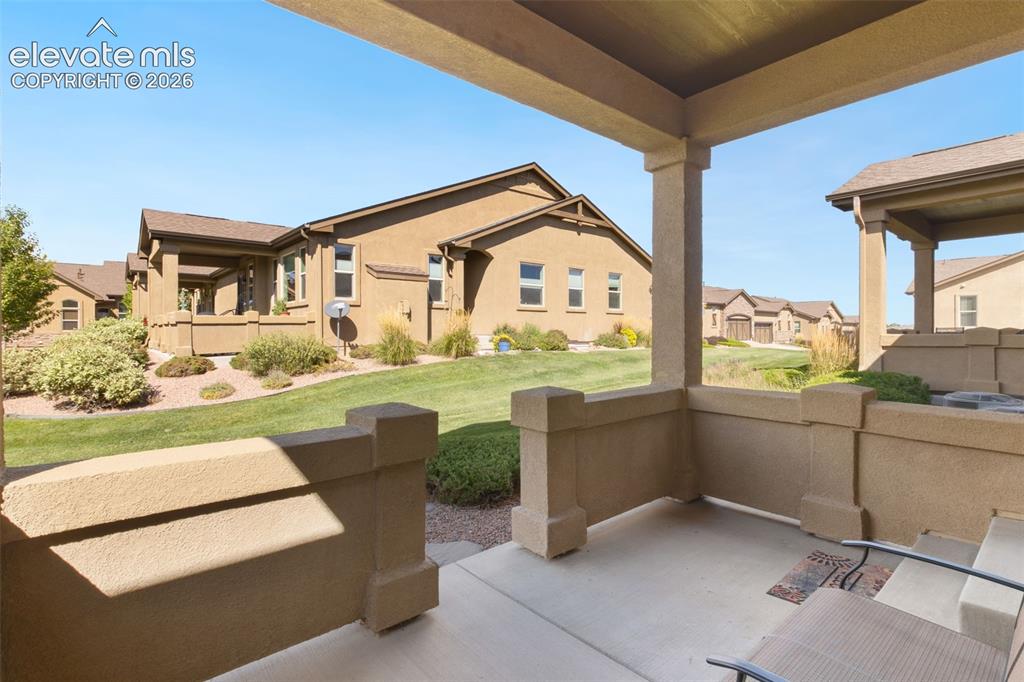 Image 35 of 39: Private covered patio space