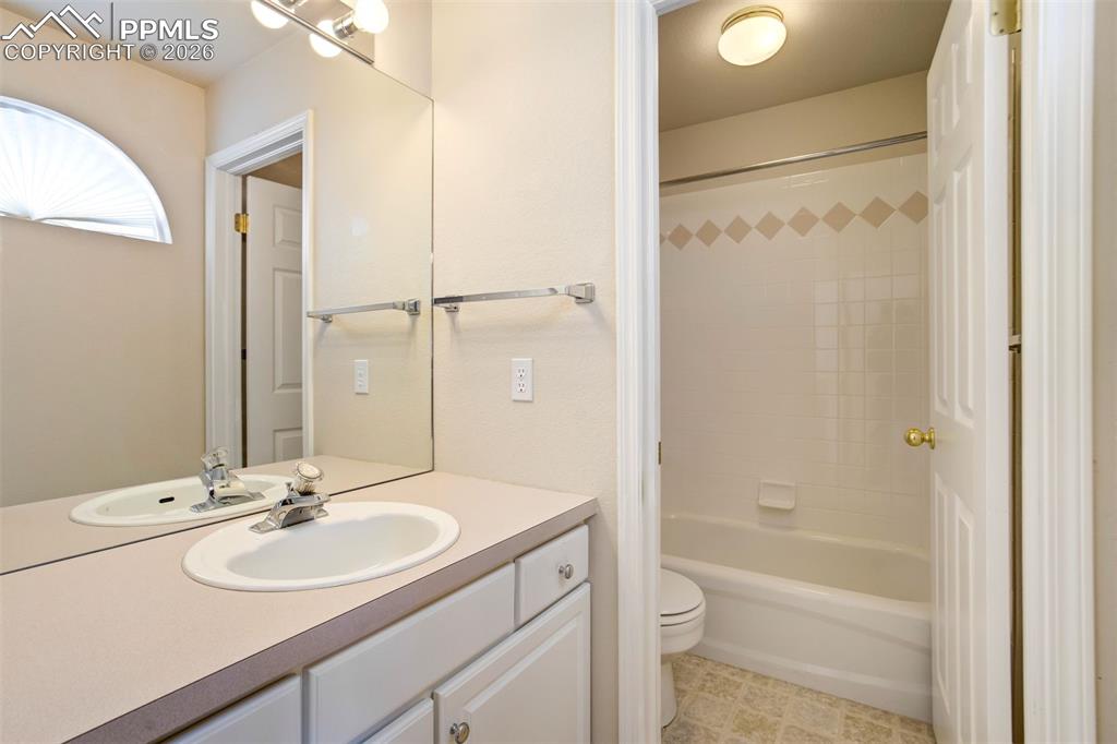 Image 26 of 44: Bathroom with a single vanity 