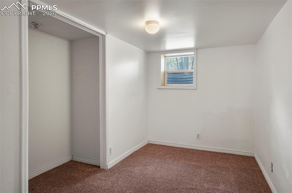 Image 19 of 29: Downstairs bedroom is a nice size