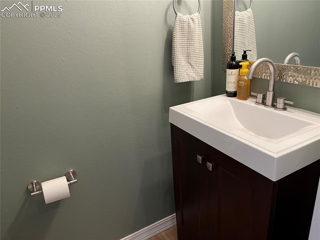Image 11 of 17: Updated Half Bath on Main