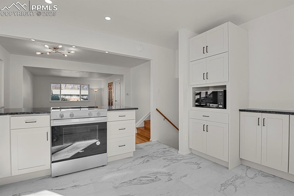 Image 10 of 37: New shaker cabinets with soft close doors