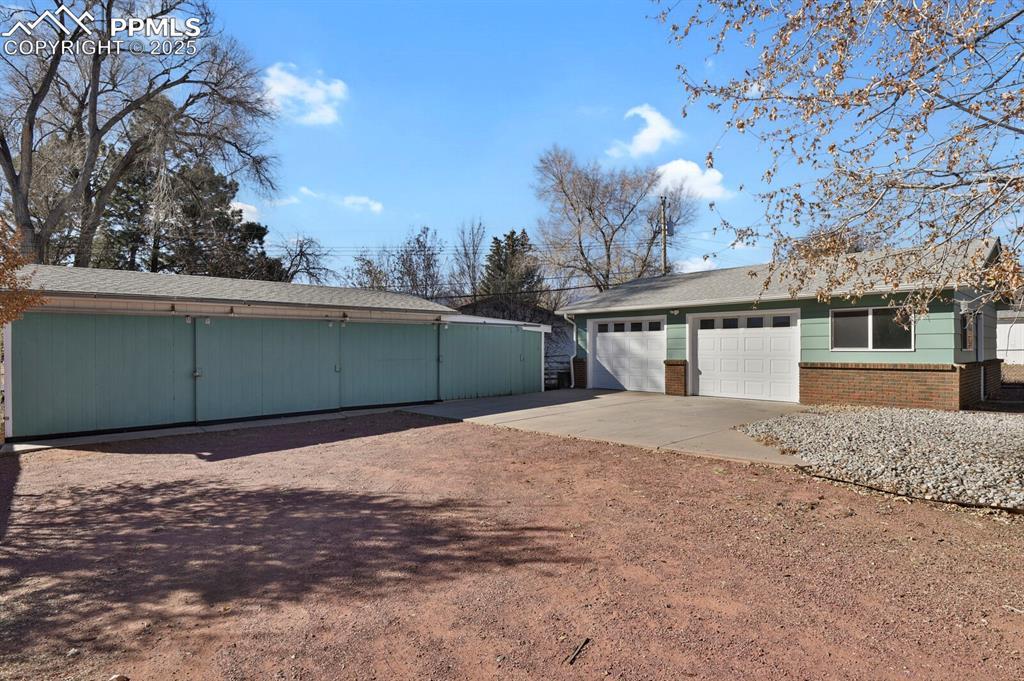 Image 28 of 37: Detached oversize two car heated garage