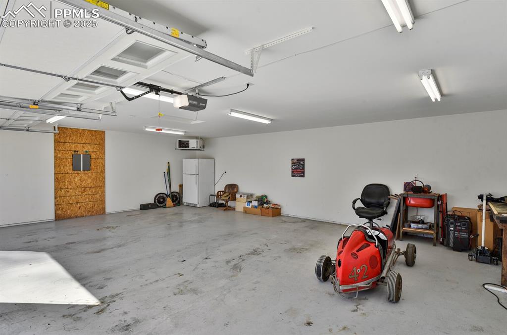 Image 31 of 37: Oversized garage and shop