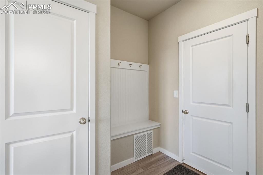 Image 46 of 50: Conveniently located off the garage.  