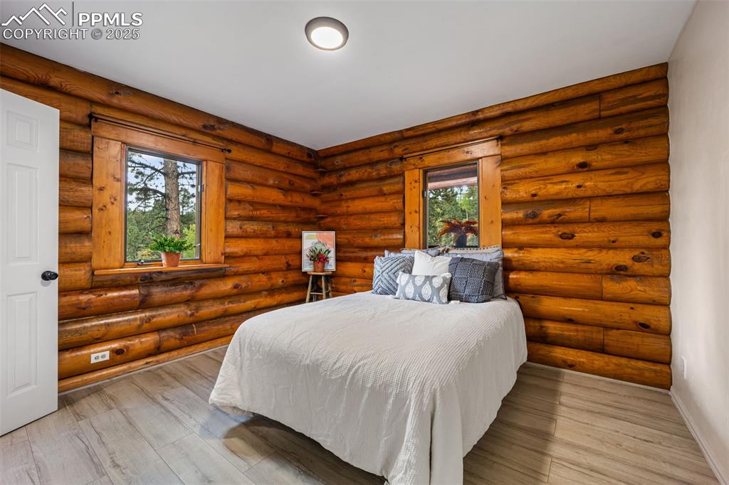 Image 14 of 48: Lovely bedroom number 1 located on the MAIN floor. Main level living availa