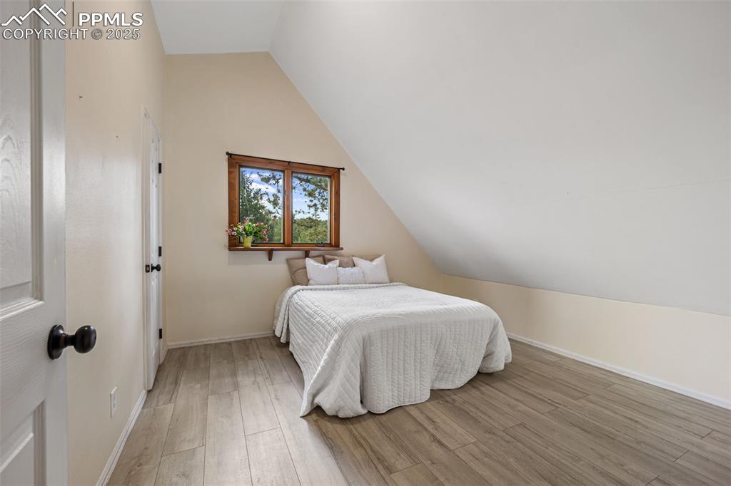 Image 16 of 48: Bedroom number 2 located on the upper level