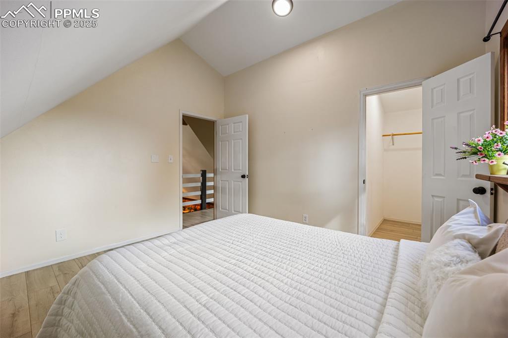 Image 17 of 48: bedroom number 2 on upper level with some privacy