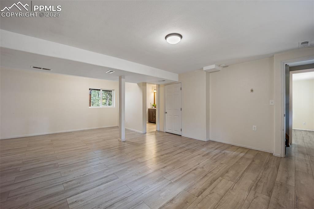 Image 24 of 48: Primary Bedroom located in the basement with en-suite