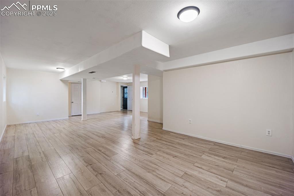 Image 25 of 48: Another view of Primary Bedroom with en-suite and walk out