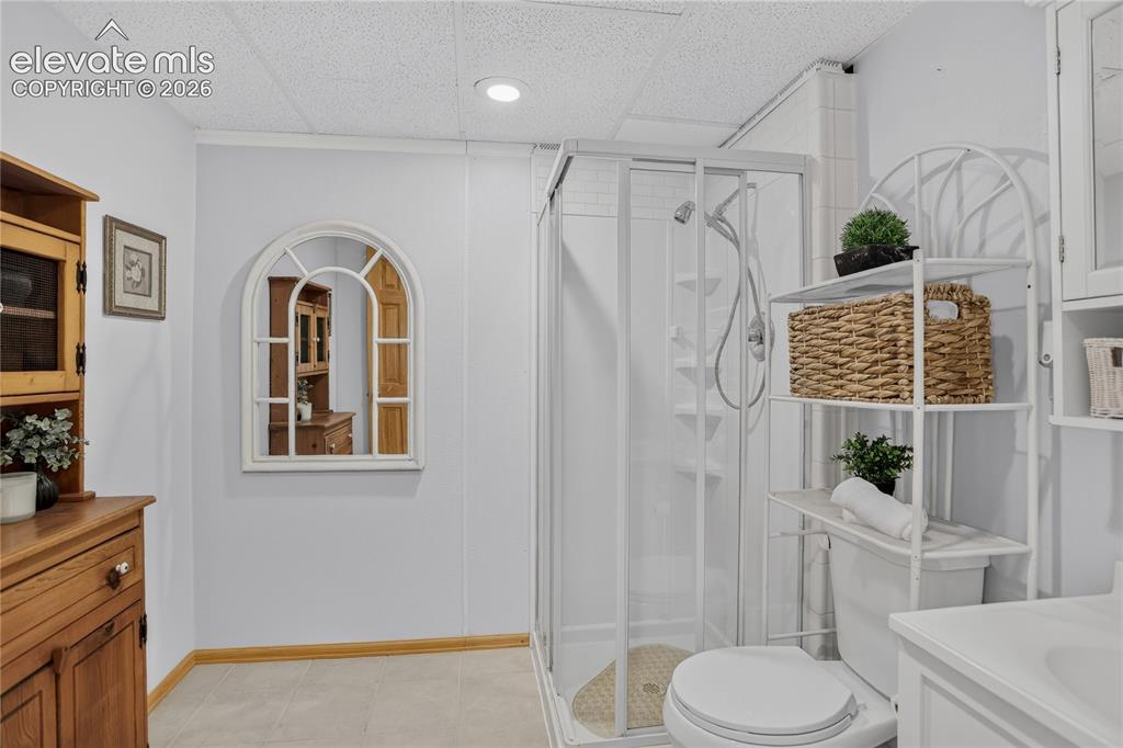 Image 16 of 25: Guest bath - lower level