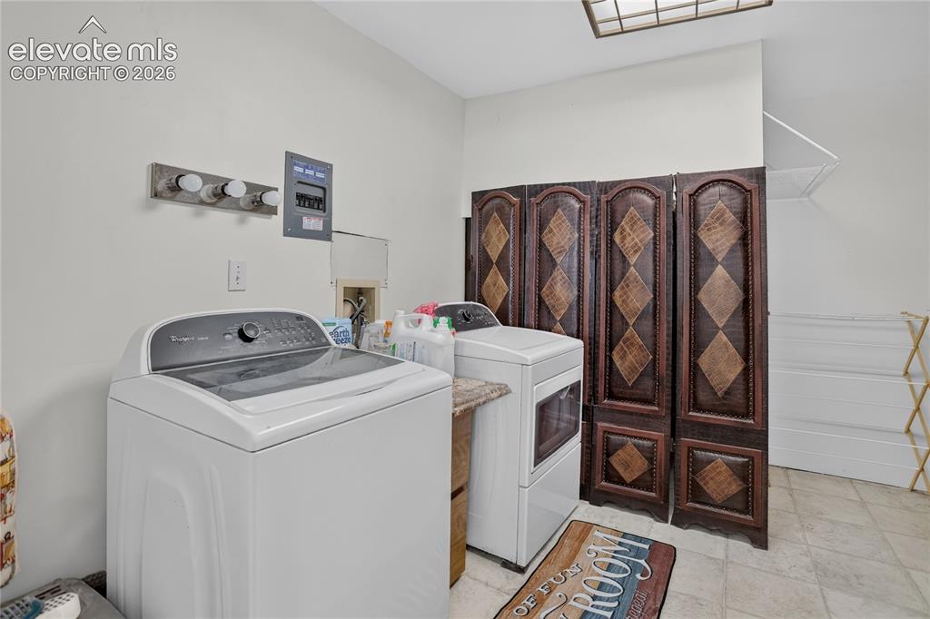Image 17 of 25: Laundry room - lower level