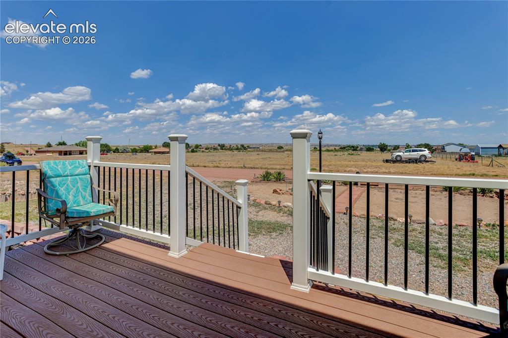 Image 3 of 25: Trex front deck