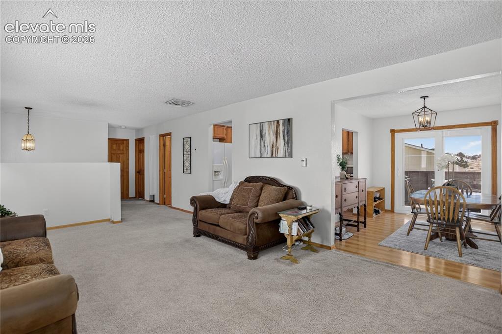 Image 5 of 25: Open flow between living spaces