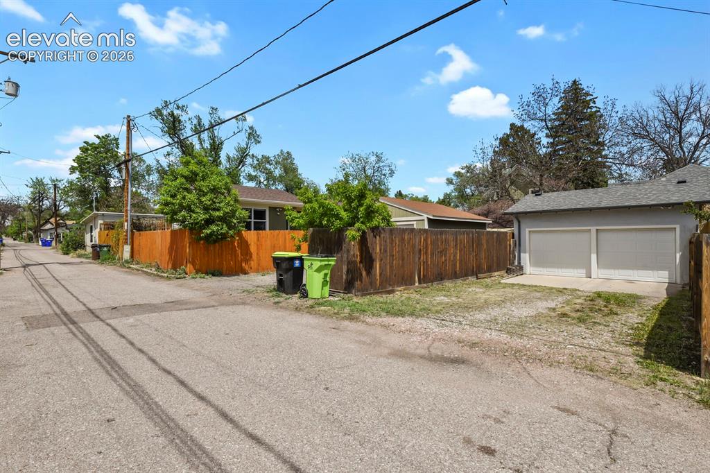 Image 46 of 46: Two car deatched garage with alley access and room to park an RV 