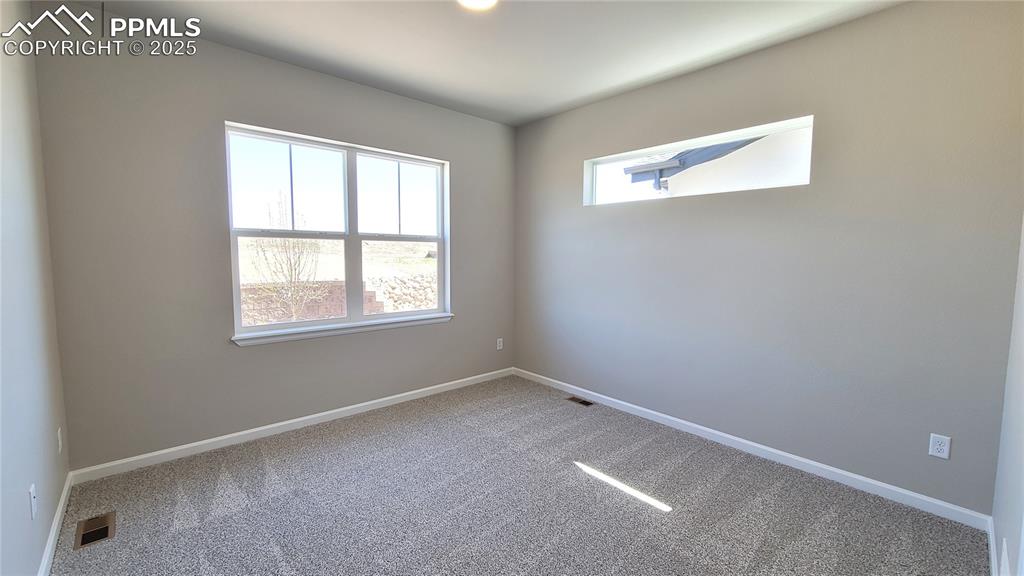 Image 18 of 33: Bedroom