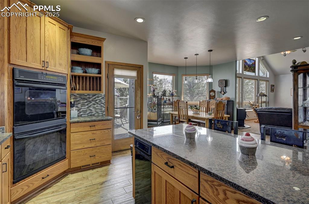 Image 10 of 50: Kitchen with ceramic tile flooring, granite counters, plenty of cabinet spa