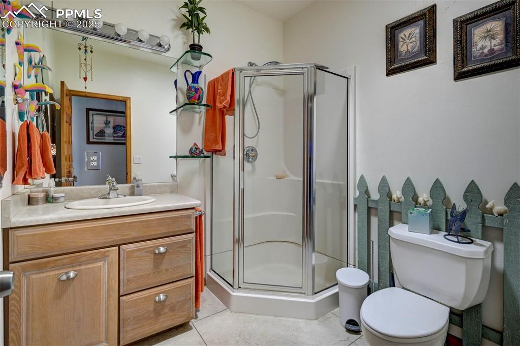 Image 19 of 50: 3/4 bathroom on main floor