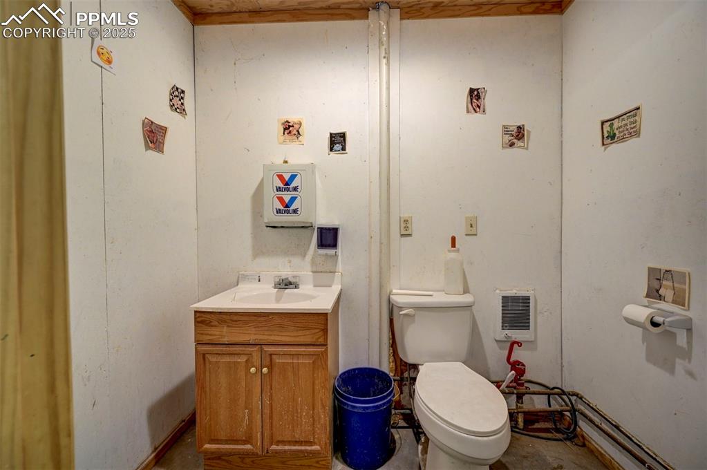 Image 41 of 50: Half bath inside barn