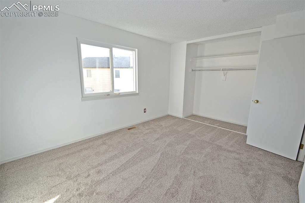 Image 20 of 34: Master Bedroom