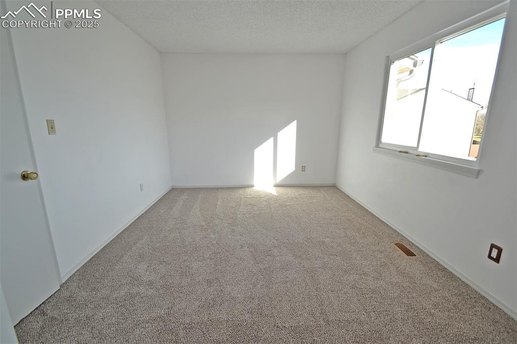 Image 24 of 34: Master Bedroom