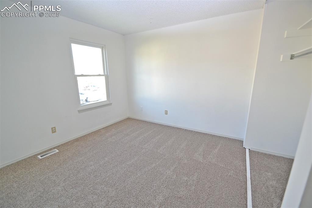 Image 27 of 34: Bedroom