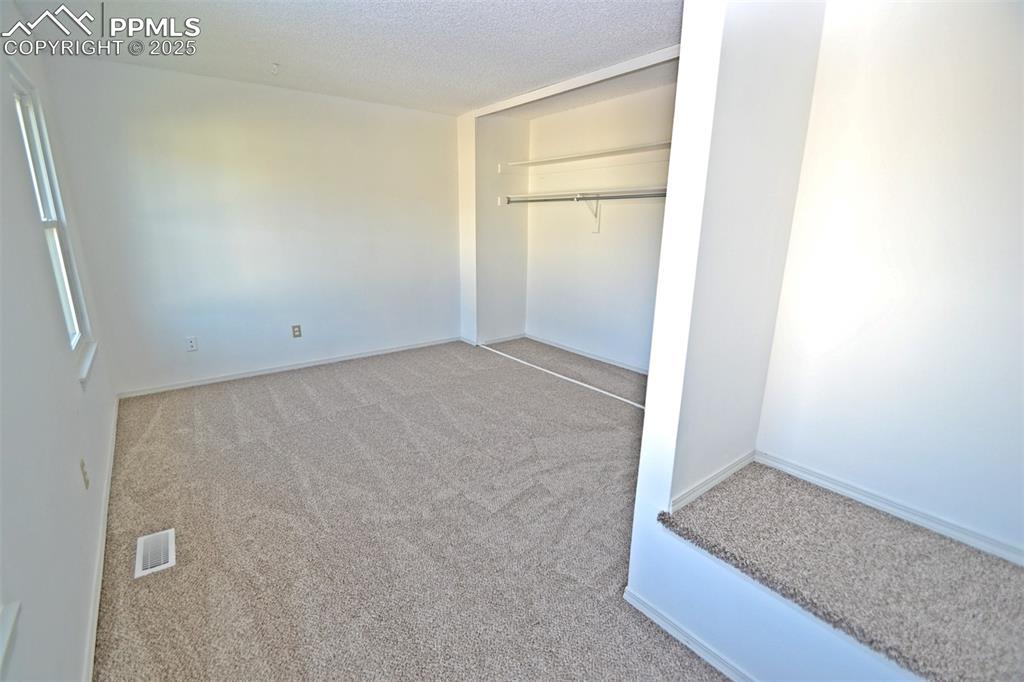 Image 28 of 34: Bedroom