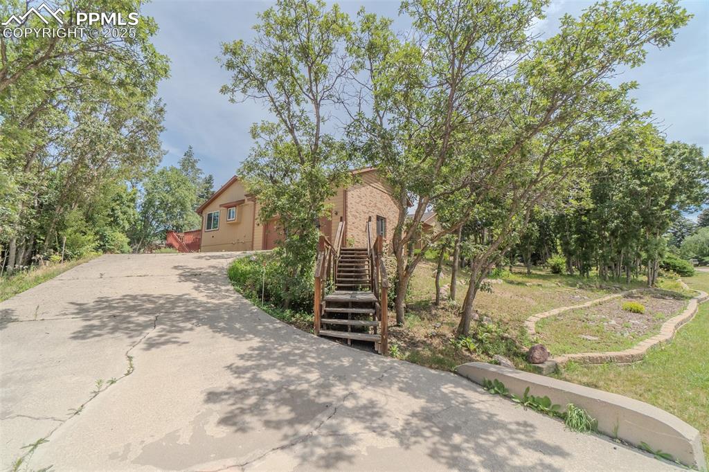 Image 2 of 48: Private lot with lots of trees