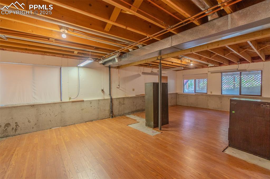 Image 31 of 48: Unfinished basement with tons of potential