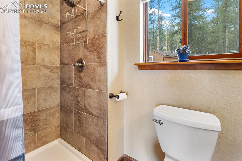 Image 12 of 42: Full bath featuring a stall shower!
