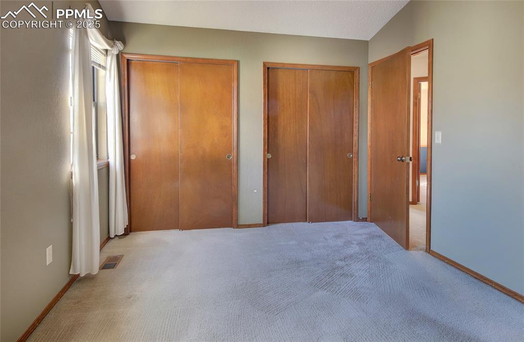 Image 17 of 33: 2 Generous Closets in the Primary Bedroom