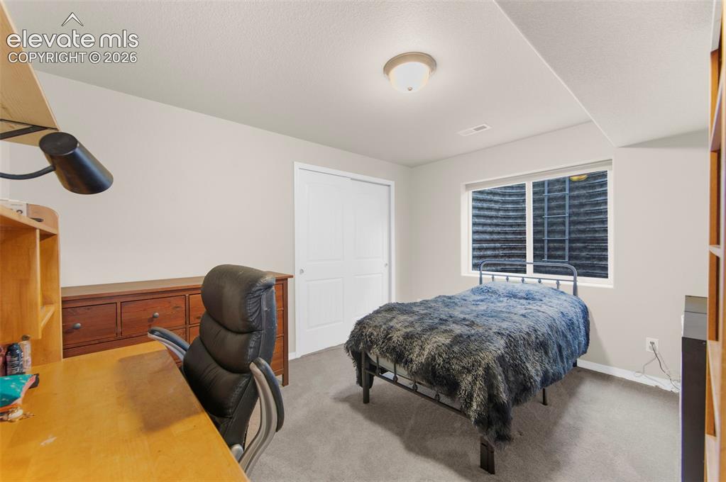 Image 28 of 37: Bedroom