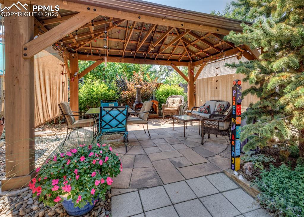 Image 40 of 49: Back Patio