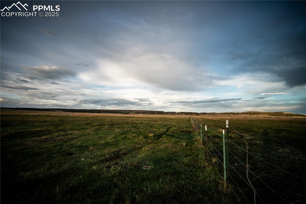 Image 4 of 10: View of yard with a rural view