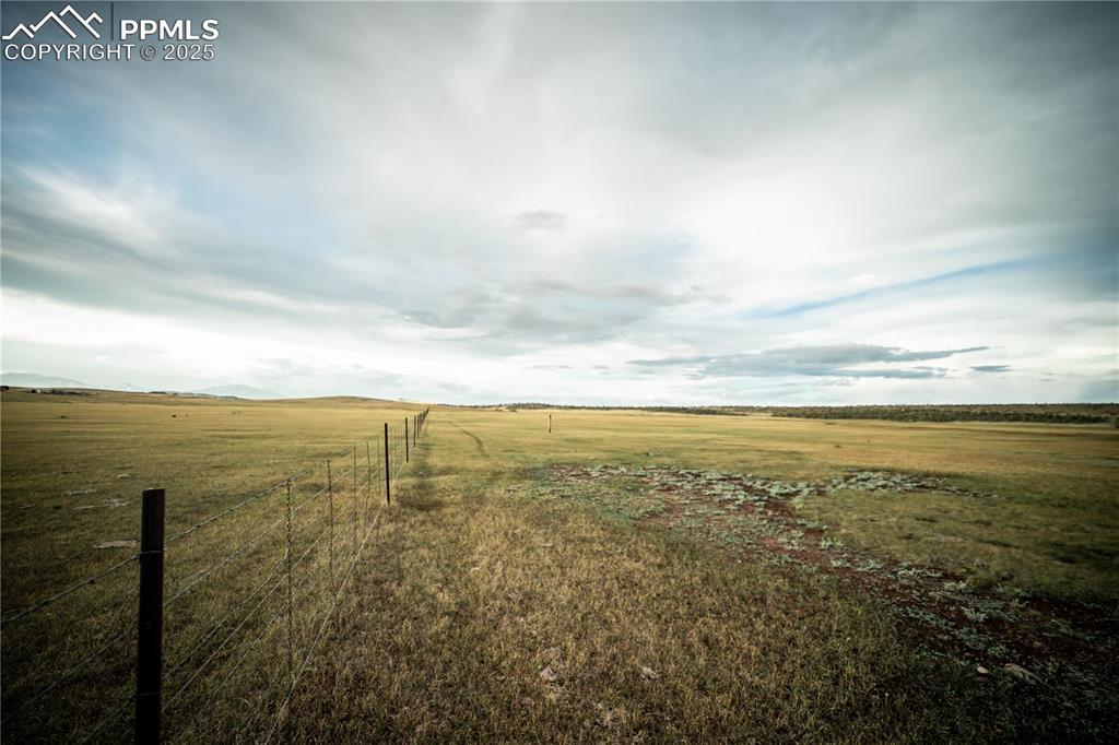 Image 8 of 10: View of yard featuring a rural view