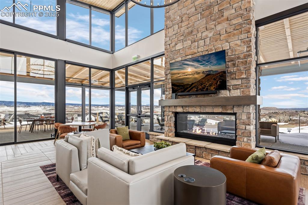 Image 44 of 49: Stunning Clubhouse with two story ceilings and views!