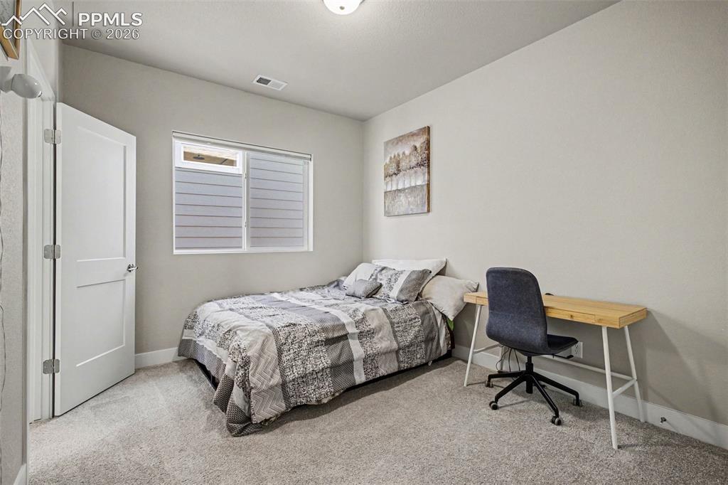 Image 17 of 26: Bedroom