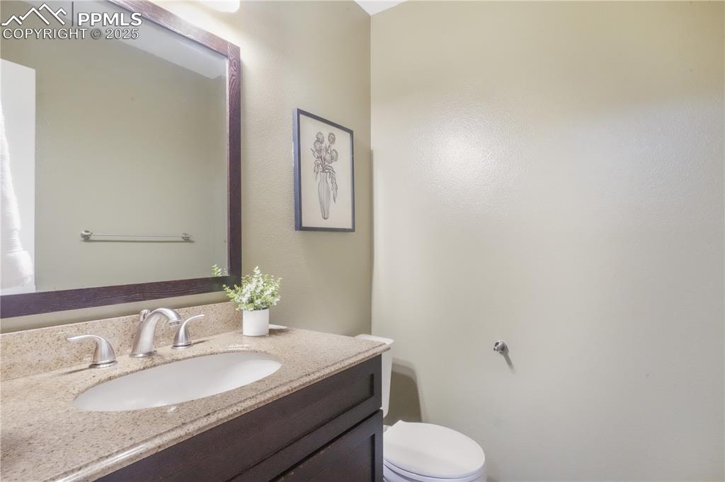 Image 22 of 47: Bathroom featuring vanity and toilet