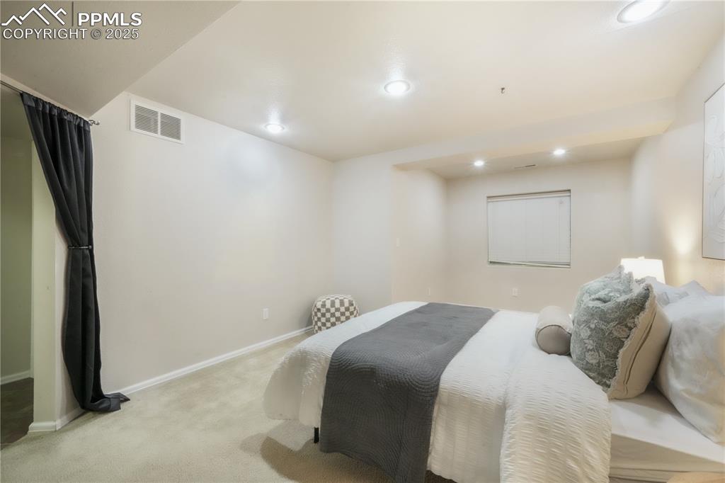 Image 35 of 47: Bedroom featuring carpet flooring and recessed lighting
