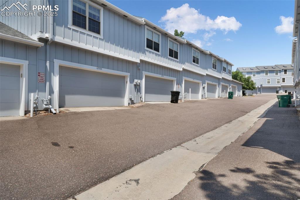Image 6 of 47: View of street with a residential view