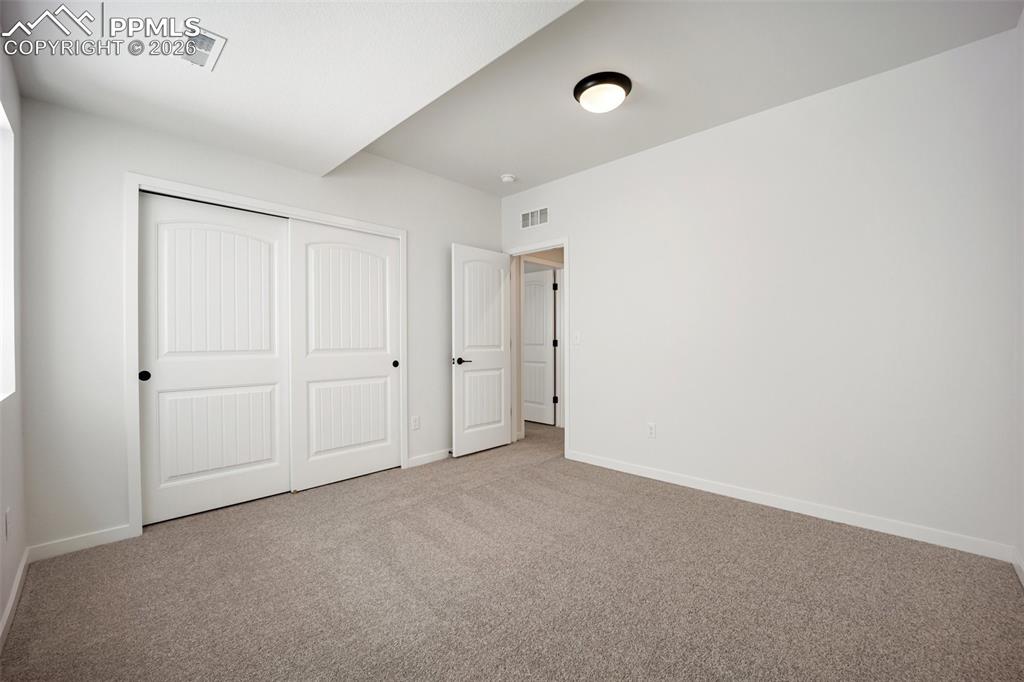Image 22 of 26: Bedroom