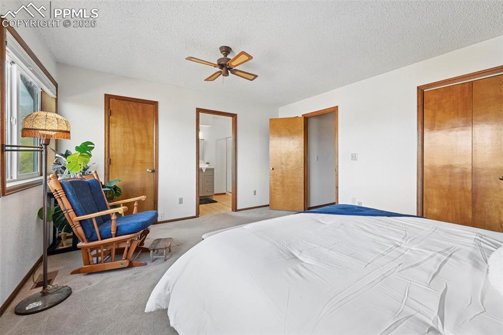 Image 17 of 45: Walk-in closet plus two additional closets - storage galour. 