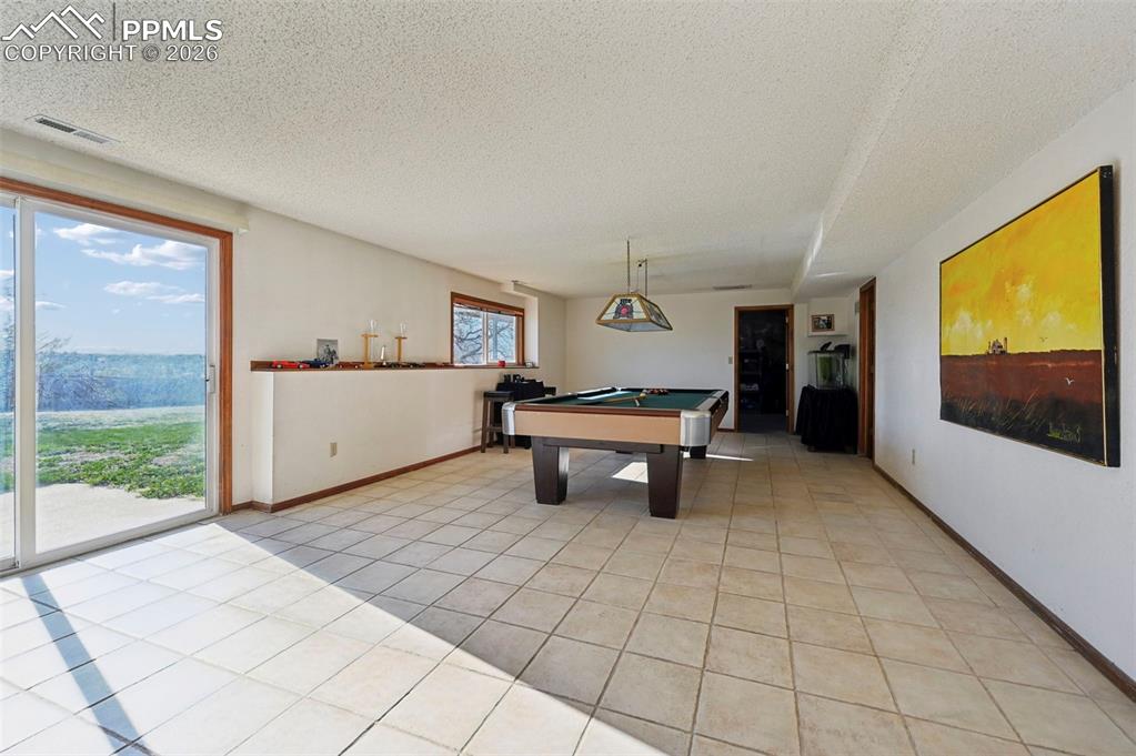 Image 27 of 45: Walk out to backyard 