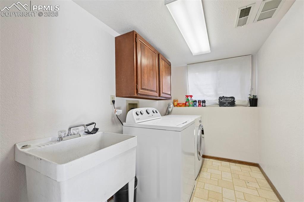 Image 28 of 45: Designated laundry space