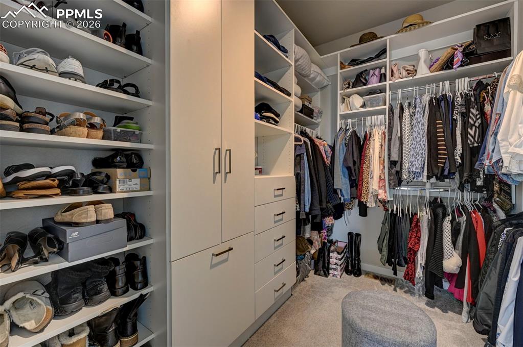 Image 22 of 41: Primary closet 