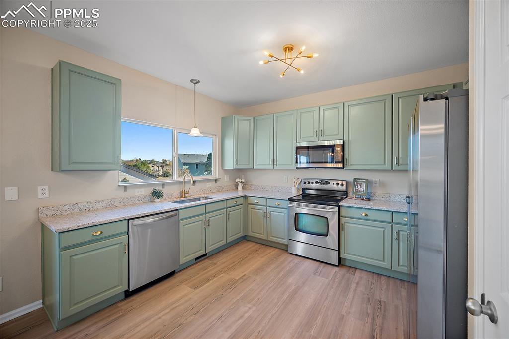 Image 10 of 45: Alternate view of kitchen