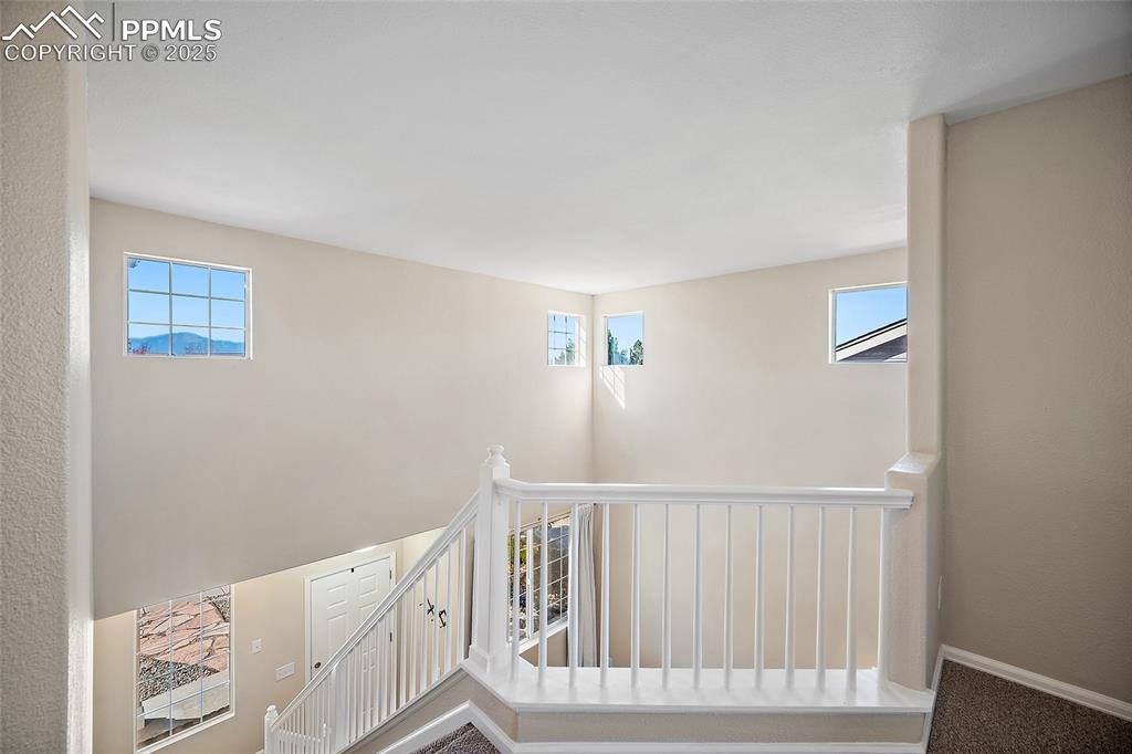 Image 16 of 45: Open area leading to upstairs bedrooms