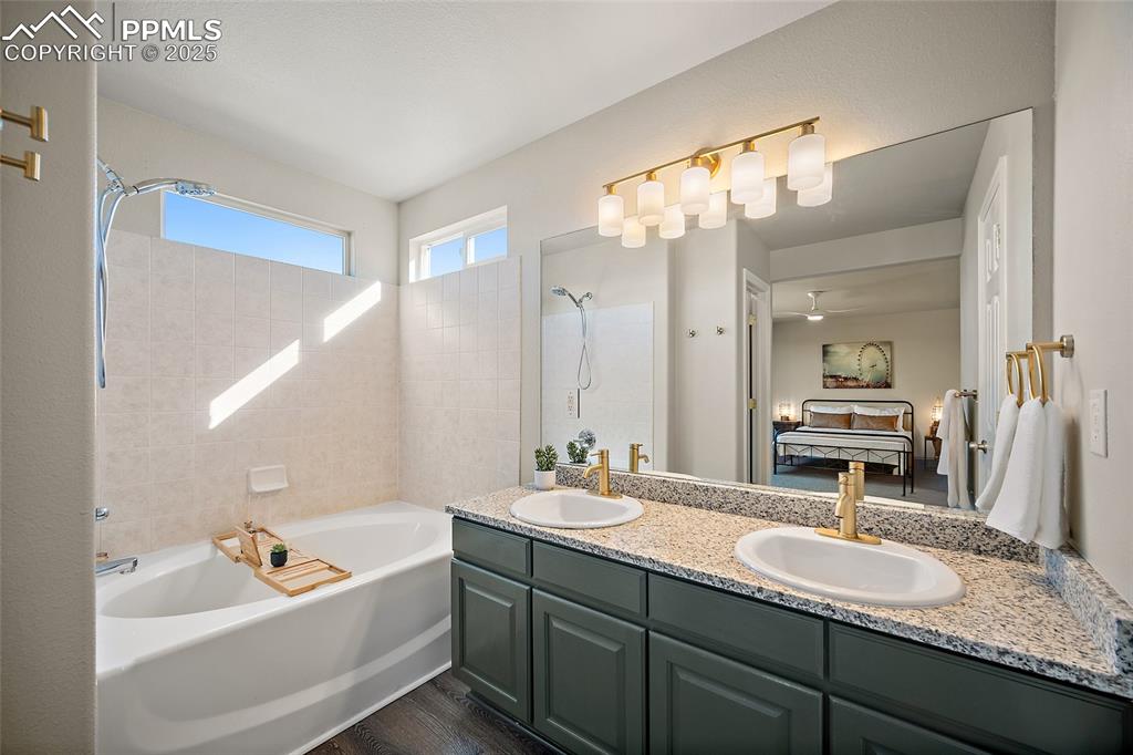 Image 20 of 45: Primary bath with garden tub