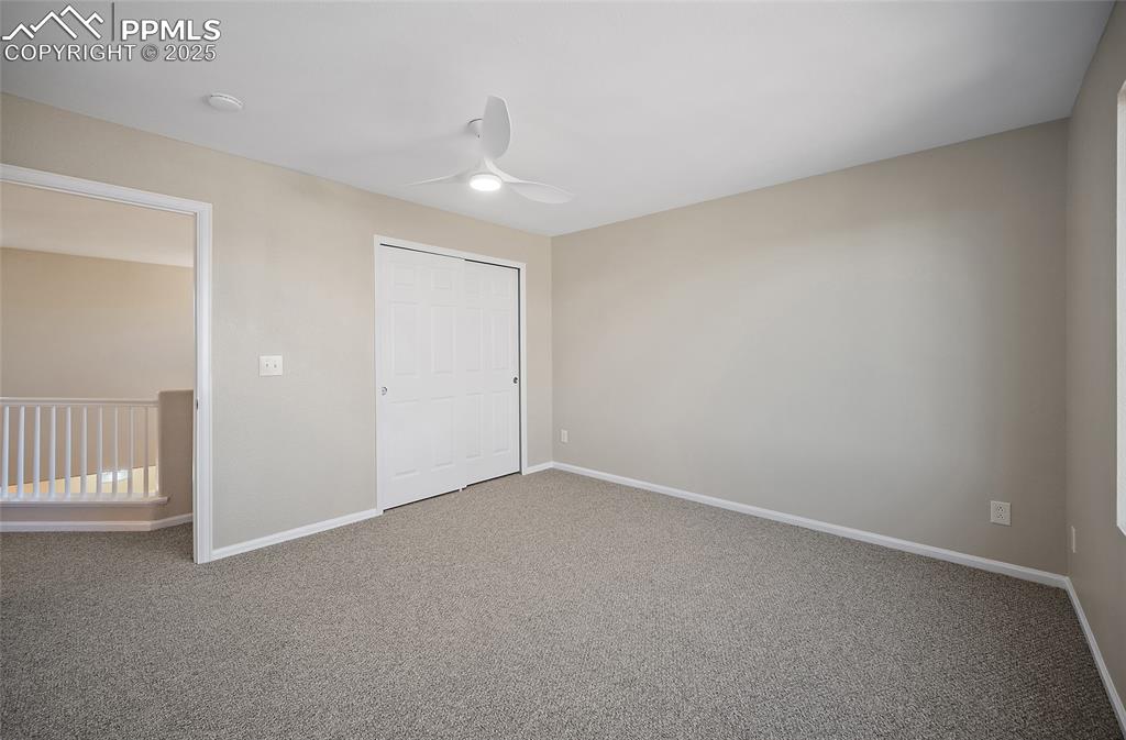 Image 29 of 45: Alternate view of guest bedroom